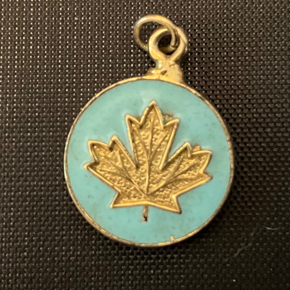 Vintage Enamel Blue Disc with Etched Gold Tone Maple Leaf Charm Or Pendant